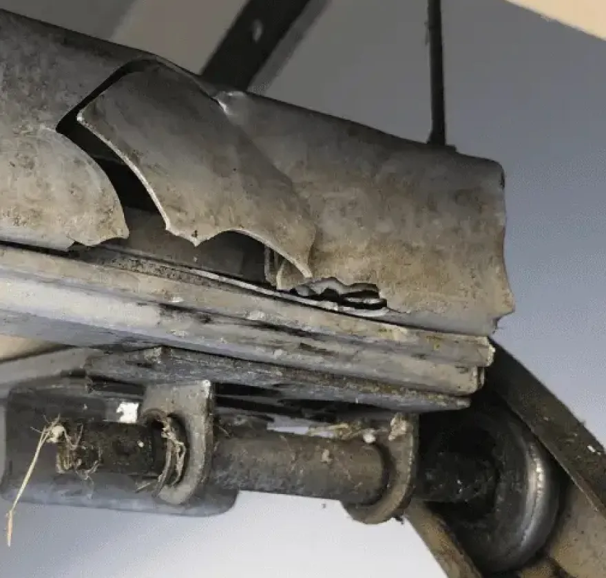 Damaged garage roller repair
